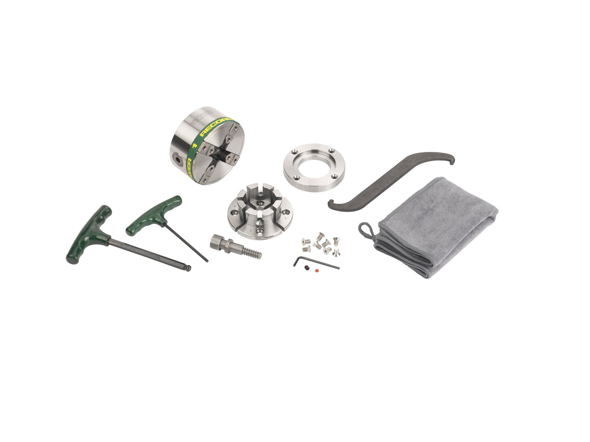 Mandrino professionale Record Power Victory con attacco 1”1/4 x 8 TPI DT, completo di ganasce modulari VersaLock da 50 mm, anello flangia e accessori.