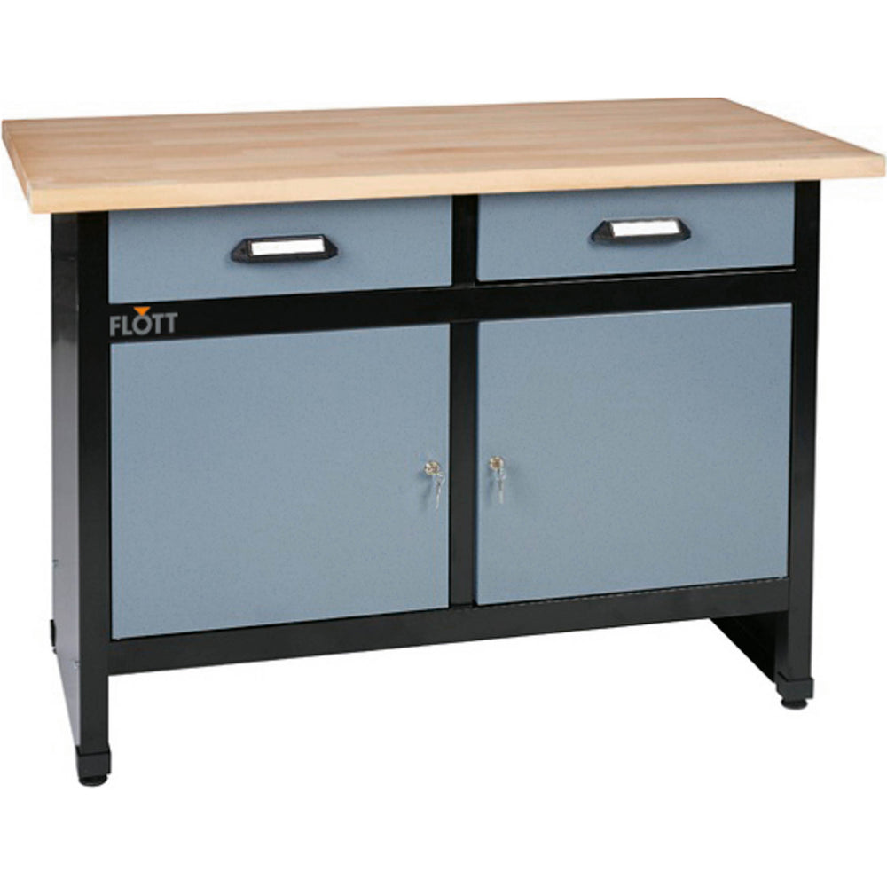 Armadio da officina Flott in lamiera d’acciaio con 2 cassetti superiori e 2 ante inferiori, posizionato accanto a una macchina utensile, ideale per riporre utensili e ricambi.